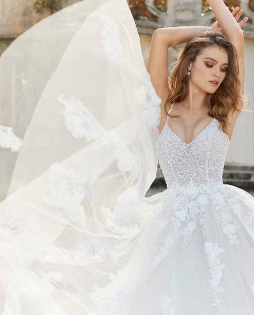 Model wearing sparkly wedding dress by morilee